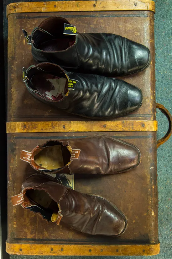 Two pairs of R.M.Williams boots in black and brown leather