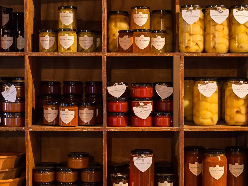 Jars of Hutton Vale Farm preserves lined up on a shelf