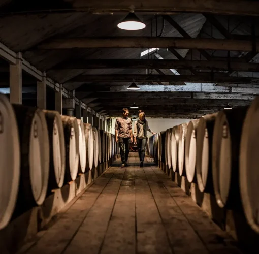 Two guests walking through Seppeltsfield’s Centennial Cellar