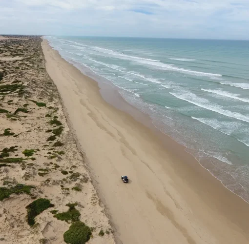 Aerial view of Goolwa beach with sand dunes, sand and surf